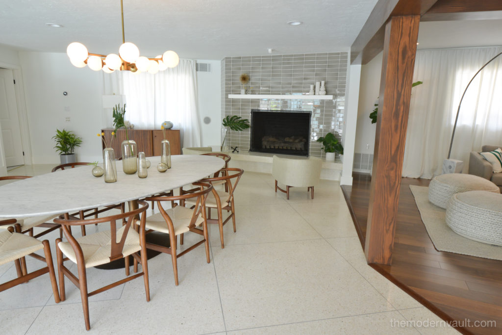 Mid Century modern dining room living room by The Modern Vault.  Stacked horizontal fireplace tiles.